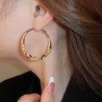 Luxury Twisted Rhinestone Earrings – Elegant, Sparkling & Timeless